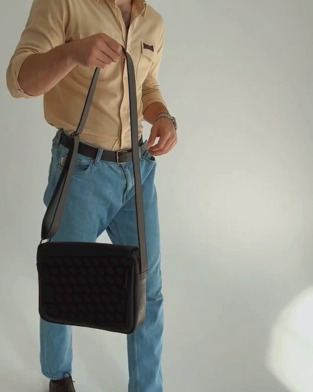 Video showing the Base handmade leather crossbody messenger bag for men from all angles, including front, back, sides, and details.